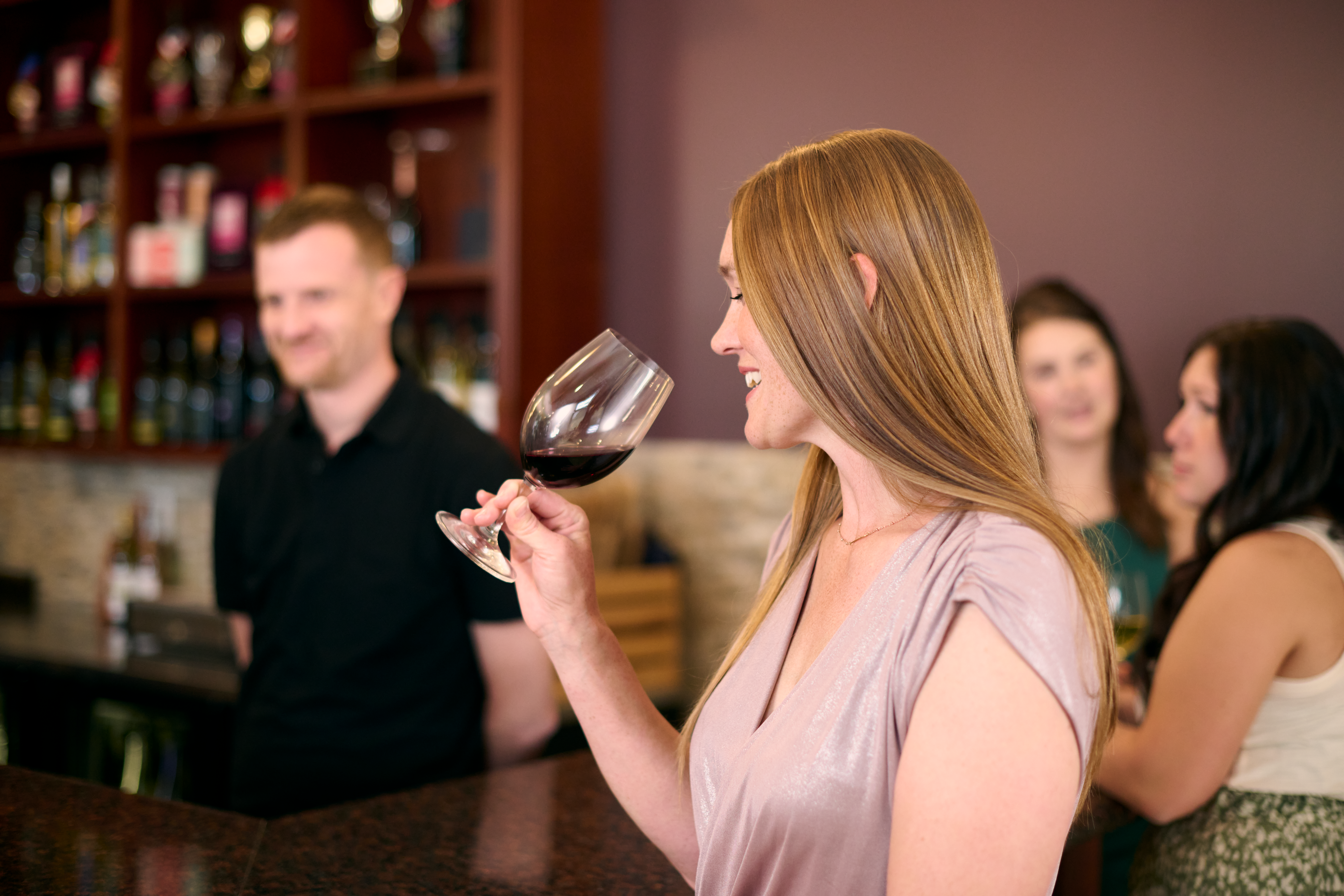 Woman seeing what aromas are in wine