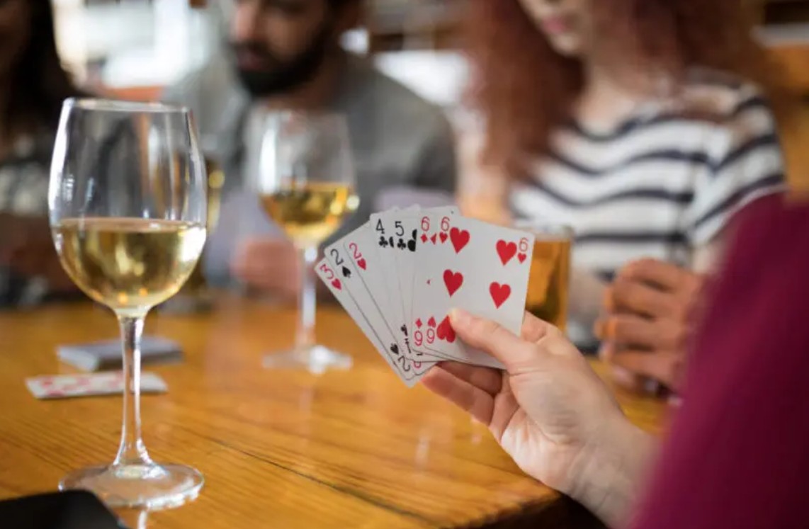 card game and wine